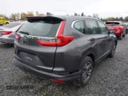 ✅ 2018 Honda CR-V LX • VIN: 2HKRW5H31JH413325 • Lot: 43518879. Listed on IAAI with 102,181 mi. Free auction sales archive from the USA and detailed vehicle history report at DreamBid. Image 4.
