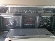 ✅ 2014 Lincoln Navigator • VIN: 5LMJJ3H59EEL04661 • Lot: 68027895. Listed on Copart with 177,186 mi. Free auction sales archive from the USA and detailed vehicle history report at DreamBid. Image 9.