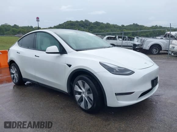 ✅ 2023 Tesla Model Y Long Range • VIN: 7SAYGDEE5PF712612 • Lot: 40392709. Listed on IAAI with 31,009 mi. Free auction sales archive from the USA and detailed vehicle history report at DreamBid. Image 1.