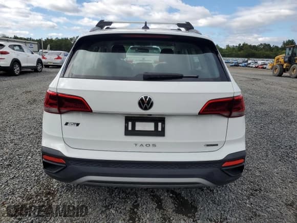 ✅ 2022 Volkswagen Taos S • VIN: 3VVAX7B25NM031533 • Лот: 69465495. Опубликован ранее на Copart с пробегом 26 498 миль. Бесплатный доступ к архиву аукционных продаж из США и подробный отчёт об истории автомобиля на DreamBid. Изображение 6.