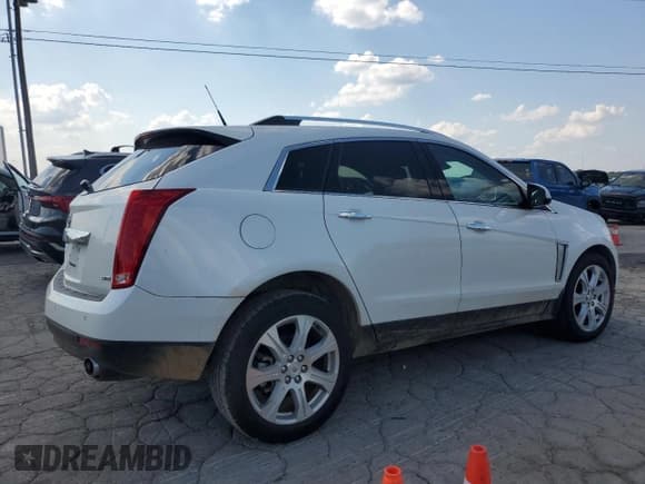 ✅ 2014 Cadillac SRX Premium Collection • VIN: 3GYFNDE36ES562355 • Лот: 63297455. Опубликован ранее на Copart с пробегом 101 401 миль. Бесплатный доступ к архиву аукционных продаж из США и подробный отчёт об истории автомобиля на DreamBid. Изображение 3.