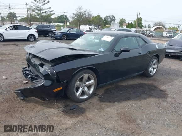 2013 Dodge Challenger R/T z VIN 2C3CDYBT7DH605131, wystawiony jako IAAI lot #43284430 z przebiegiem 55 656 mil mil oraz . Historia ofert i sprzedaży dostępna na DreamBid. Obrazek 2.