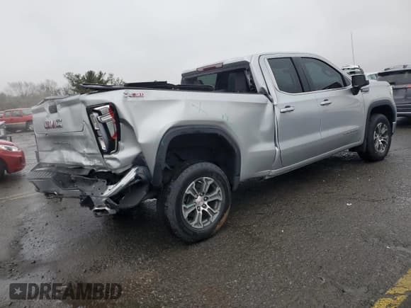 ✅ 2021 GMC Sierra 1500 SLE • VIN: 1GTR9BED2MZ320488 • Лот: 50100875. Опубликован ранее на Copart с пробегом 44 175 миль. Бесплатный доступ к архиву аукционных продаж из США и подробный отчёт об истории автомобиля на DreamBid. Изображение 3.