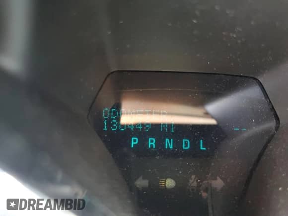 2015 Chevrolet Traverse LT z VIN 1GNKRHKD1FJ209447, wystawiony jako Copart lot #71116855 z przebiegiem 130 449 mil mil oraz Szkoda całkowita • Salvage title. Historia ofert i sprzedaży dostępna na DreamBid. Obrazek 9.