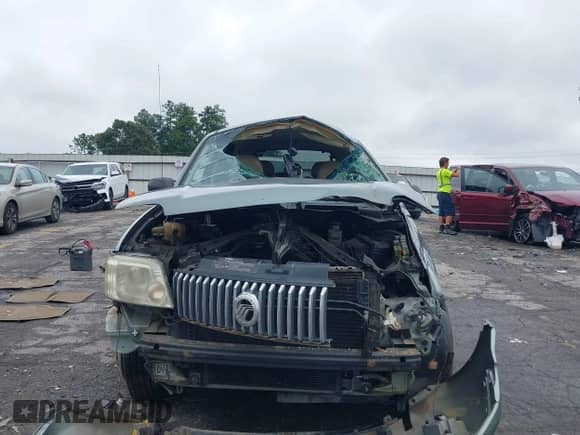 2006 Mercury Mariner Luxury with VIN 4M2YU57196KJ01063, listed as a IAAI auction lot 42907986 with Not provided miles and . Bid and sale history available at DreamBid. Image 12.