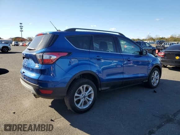 ✅ 2017 Ford Escape SE • VIN: 1FMCU9GD9HUE83194 • Lot: 91211475. Listed on Copart with 115,551 mi. Free auction sales archive from the USA and detailed vehicle history report at DreamBid. Image 3.