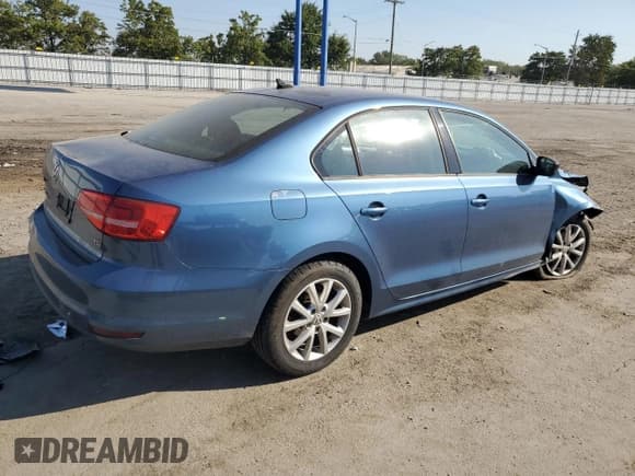 ✅ 2015 Volkswagen Jetta SE • VIN: 3VWD17AJ0FM352464 • Lot: 84861795. Listed on Copart with 133,524 mi. Free auction sales archive from the USA and detailed vehicle history report at DreamBid. Image 3.