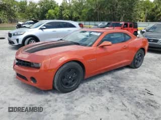 2013 Chevrolet Camaro LS z VIN 2G1FE1E34D9143316, wystawiony jako Copart lot #62813745 z przebiegiem 54 888 mil mil oraz Szkoda całkowita • Salvage title. Historia ofert i sprzedaży dostępna na DreamBid. Obrazek 1.