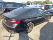 ✅ 2023 Volkswagen Jetta Sport • VIN: 3VWAM7BU5PM052116 • Lot: 43210653. Listed on IAAI with 27,675 mi. Free auction sales archive from the USA and detailed vehicle history report at DreamBid. Image 4.