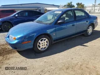 ✅ 2002 Saturn SL • VIN: 1G8ZK54772Z130842 • Lot: 84471205. Listed on Copart with 65,826 mi. Free auction sales archive from the USA and detailed vehicle history report at DreamBid. Image 1.