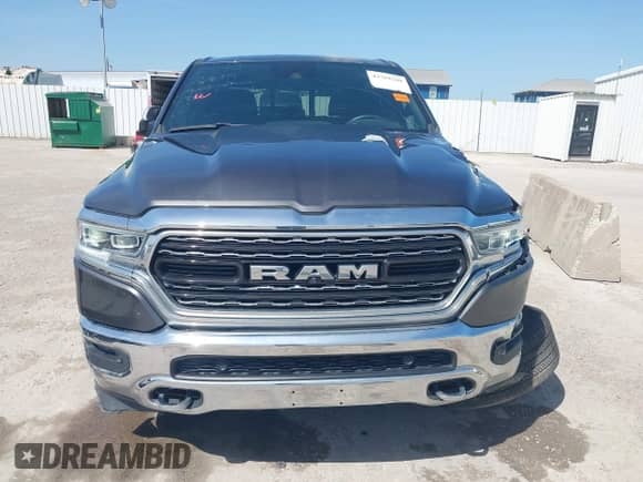 2023 Ram 1500 Limited with VIN 1C6SRFHT9PN583656, listed as a IAAI auction lot 42789248 with 50,276 mi miles and . Bid and sale history available at DreamBid. Image 13.