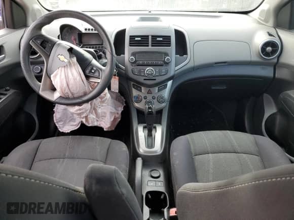 2012 Chevrolet Sonic LT z VIN 1G1JC5SB9C4171004, wystawiony jako Copart lot #73356883 z przebiegiem 155 863 mil mil oraz Szkoda całkowita • Salvage title. Historia ofert i sprzedaży dostępna na DreamBid. Obrazek 8.