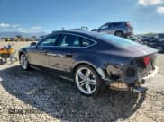 ✅ 2014 Audi S7 Prestige • VIN: WAUW2BFC7EN040925 • Lot: 84948295. Listed on Copart with 102,259 mi. Free auction sales archive from the USA and detailed vehicle history report at DreamBid. Image 2.