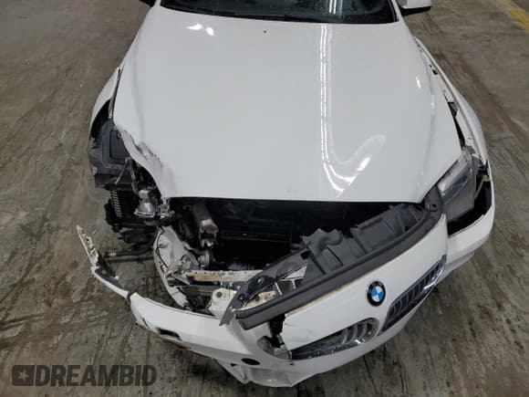 ✅ 2013 BMW 6 Series 650i xDrive • VIN: WBAYM1C58DDZ02671 • Лот: 59509955. Опубликован ранее на Copart с пробегом 76 630 миль. Бесплатный доступ к архиву аукционных продаж из США и подробный отчёт об истории автомобиля на DreamBid. Изображение 11.