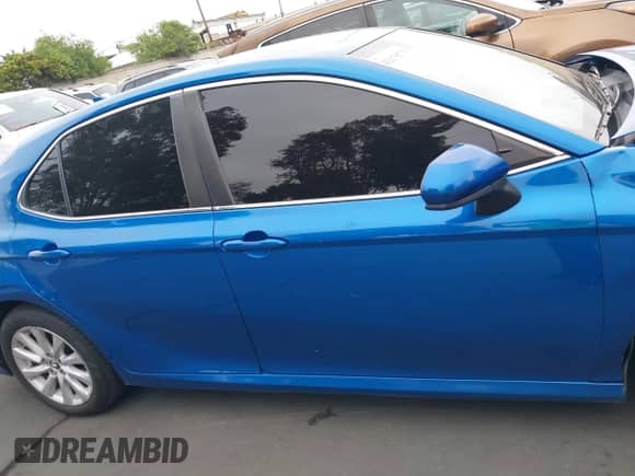 2019 Toyota Camry LE with VIN 4T1B11HK8KU237019, listed as a IAAI auction lot 42170775 with 71,024 mi miles and . Bid and sale history available at DreamBid. Image 14.