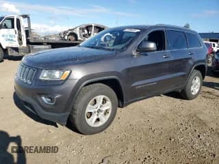 ✅ 2015 Jeep Grand Cherokee Laredo • VIN: 1C4RJFAG4FC793992 • Lot: 87296455. Listed on Copart with 234,821 mi. Free auction sales archive from the USA and detailed vehicle history report at DreamBid. Image 1.