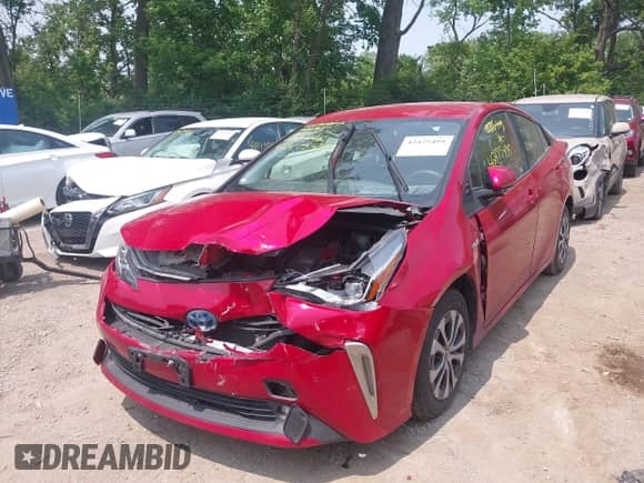 2022 Toyota Prius LE z VIN JTDL9MFUXN3035445, wystawiony jako IAAI lot #42475495 z przebiegiem 63 000 mil mil oraz . Historia ofert i sprzedaży dostępna na DreamBid. Obrazek 2.