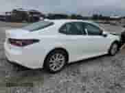 2023 Toyota Camry LE с VIN 4T1C11BK2PU075098, выставлен на аукционе Copart как лот 71546315 с пробегом 64 124 миль миль и Списание • Salvage title. История ставок и продаж доступна на DreamBid. Изображение 3.