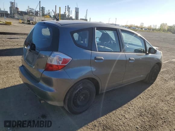 ✅ 2013 Honda Fit • VIN: LUCGE8H3XD3004182 • Лот: 84290895. Опубликован ранее на Copart с пробегом 157 415 миль. Бесплатный доступ к архиву аукционных продаж из США и подробный отчёт об истории автомобиля на DreamBid. Изображение 3.