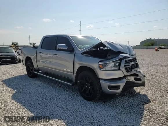 2023 Ram 1500 Laramie z VIN 1C6SRFJT7PN662379, wystawiony jako Copart lot #81452325 z przebiegiem 27 254 mil mil oraz Szkoda całkowita • Salvage title. Historia ofert i sprzedaży dostępna na DreamBid. Obrazek 13.