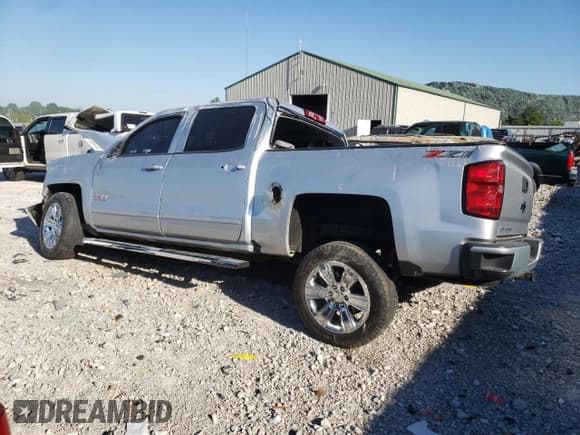 ✅ 2018 Chevrolet Silverado 1500 LT • VIN: 3GCUKREC1JG471106 • Лот: 58884434. Опубликован ранее на Copart с пробегом Не указан. Бесплатный доступ к архиву аукционных продаж из США и подробный отчёт об истории автомобиля на DreamBid. Изображение 2.