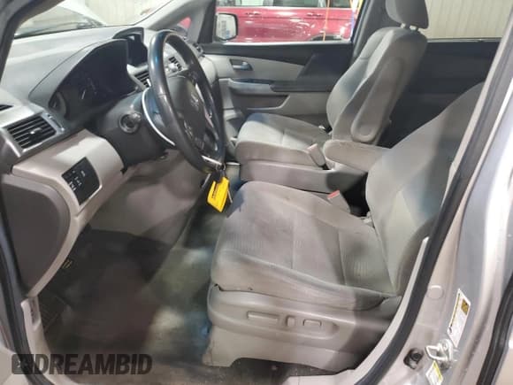 ✅ 2012 Honda Odyssey EX • VIN: 5FNRL5H49CB063171 • Лот: 93843765. Опубликован ранее на Copart с пробегом 144 215 миль. Бесплатный доступ к архиву аукционных продаж из США и подробный отчёт об истории автомобиля на DreamBid. Изображение 7.