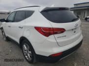 ✅ 2015 Hyundai Santa Fe • VIN: 5XYZW4LA2FG251882 • Лот: 45662143. Опубликован ранее на Copart с пробегом 107 049 миль. Бесплатный доступ к архиву аукционных продаж из США и подробный отчёт об истории автомобиля на DreamBid. Изображение 2.
