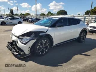 ✅ 2022 Kia EV6 Wind • VIN: KNDC34LA4N5062964 • Лот: 86432175. Опубликован ранее на Copart с пробегом 35 412 миль. Бесплатный доступ к архиву аукционных продаж из США и подробный отчёт об истории автомобиля на DreamBid. Изображение 1.