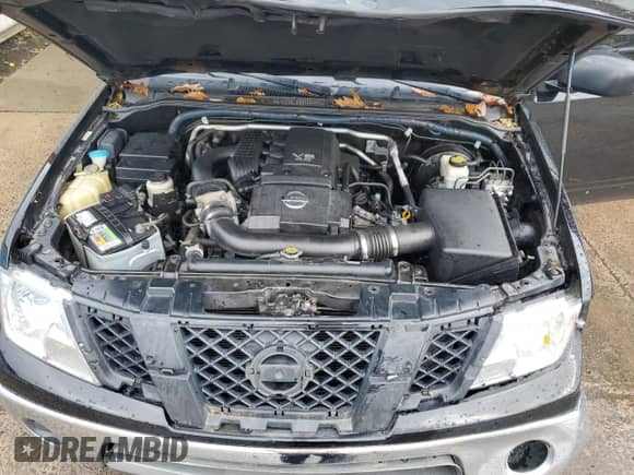 2011 Nissan Frontier Pro-4X z VIN 1N6AD0CW2BC424898, wystawiony jako Copart lot #90663835 z przebiegiem 115 988 mil mil oraz Szkoda całkowita • Salvage title. Historia ofert i sprzedaży dostępna na DreamBid. Obrazek 11.