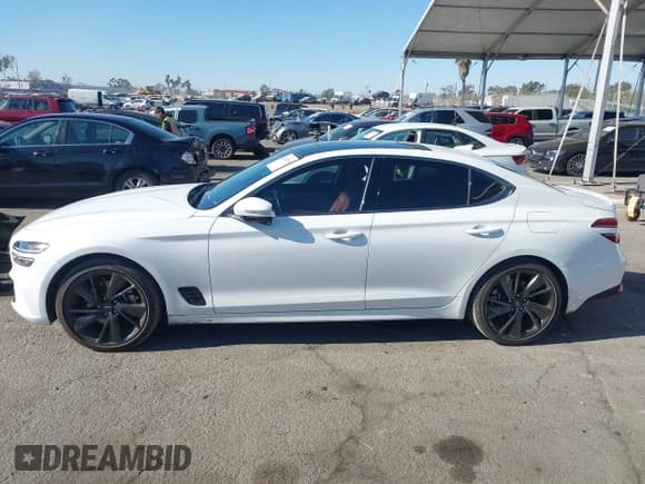 ✅ 2023 Genesis G70 2.0T • VIN: KMTG34TAXPU112861 • Lot: 41320749. Listed on IAAI with 33,824 mi. Free auction sales archive from the USA and detailed vehicle history report at DreamBid. Image 14.