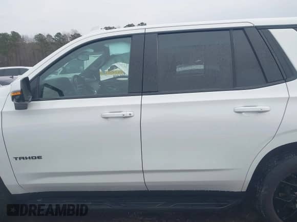 2023 Chevrolet Tahoe RST with VIN 1GNSKRKL5PR124079, listed as a IAAI auction lot 41389636 with 18,920 mi miles and . Bid and sale history available at DreamBid. Image 14.