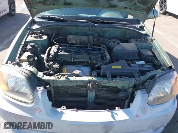 2005 Hyundai Accent GLS z VIN KMHCG45C95U620716, wystawiony jako IAAI lot #41740573 z przebiegiem 187 971 mil mil oraz . Historia ofert i sprzedaży dostępna na DreamBid. Obrazek 10.