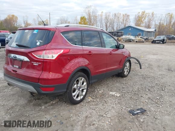 ✅ 2015 Ford Escape Titanium • VIN: 1FMCU9J90FUB74988 • Lot: 43561618. Listed on IAAI with 93,694 mi. Free auction sales archive from the USA and detailed vehicle history report at DreamBid. Image 4.