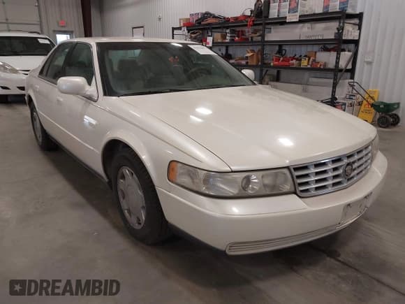 ✅ 2000 Cadillac Seville Luxury SLS • VIN: 1G6KS54Y3YU321733 • Лот: 43634671. Опубликован ранее на IAAI с пробегом 133 384 миль. Бесплатный доступ к архиву аукционных продаж из США и подробный отчёт об истории автомобиля на DreamBid. Изображение 1.
