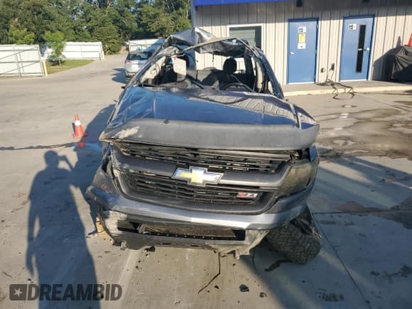 ✅ 2018 Chevrolet Colorado 4WD Z71 • VIN: 1GCPTDE16J1303407 • Лот: 82025745. Опубликован ранее на Copart с пробегом Не указан. Бесплатный доступ к архиву аукционных продаж из США и подробный отчёт об истории автомобиля на DreamBid. Изображение 5.