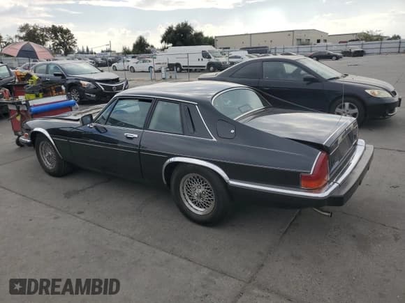 ✅ 1989 Jaguar XJS • VIN: SAJNA5849KC156340 • Lot: 81369415. Wystawiony na Copart z przebiegiem 82 457 mil. Bezpłatny archiwum sprzedaży aukcyjnych z USA i szczegółowy raport historii pojazdu na DreamBid. Zdjęcie 2.