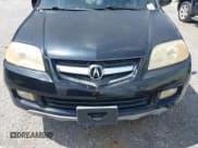 ✅ 2006 Acura MDX Touring • VIN: 2HNYD18676H515663 • Lot: 42496700. Wystawiony na IAAI z przebiegiem 196 595 mil. Bezpłatny archiwum sprzedaży aukcyjnych z USA i szczegółowy raport historii pojazdu na DreamBid. Zdjęcie 6.