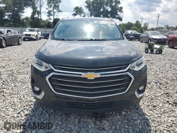 2021 Chevrolet Traverse LT Cloth z VIN 1GNERGKW8MJ253757, wystawiony jako Copart lot #71222165 z przebiegiem 87 679 mil mil oraz Szkoda całkowita • Salvage title. Historia ofert i sprzedaży dostępna na DreamBid. Obrazek 5.
