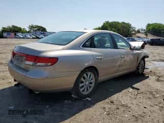 2006 Hyundai Azera SE с VIN KMHFC46F46A034316, выставлен на аукционе Copart как лот 61857655 с пробегом 203 011 миль миль и Списание • Salvage title. История ставок и продаж доступна на DreamBid. Изображение 3.