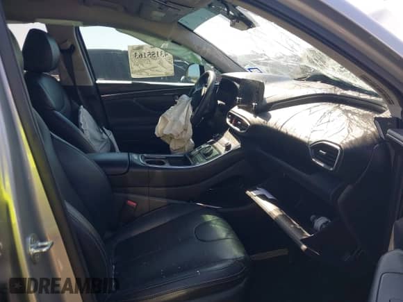 2021 Hyundai Santa Fe SEL z VIN 5NMS24AJ7MH307785, wystawiony jako IAAI lot #43155163 z przebiegiem 69 928 mil mil oraz . Historia ofert i sprzedaży dostępna na DreamBid. Obrazek 5.