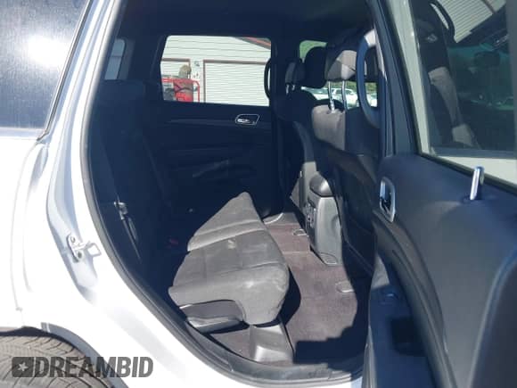 2018 Jeep Grand Cherokee Altitude z VIN 1C4RJFAGXJC504400, wystawiony jako IAAI lot #43318140 z przebiegiem 100 572 mil mil oraz . Historia ofert i sprzedaży dostępna na DreamBid. Obrazek 8.