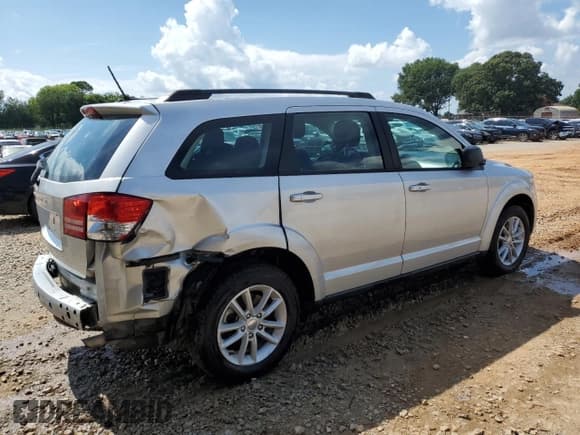 ✅ 2014 Dodge Journey SE • VIN: 3C4PDCAB5ET202511 • Lot: 64209445. Listed on Copart with 69,583 mi. Free auction sales archive from the USA and detailed vehicle history report at DreamBid. Image 3.
