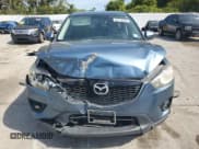 ✅ 2015 Mazda CX-5 Touring • VIN: JM3KE2CY1F0438324 • Lot: 84774345. Wystawiony na Copart z przebiegiem 172 855 mil. Bezpłatny archiwum sprzedaży aukcyjnych z USA i szczegółowy raport historii pojazdu na DreamBid. Zdjęcie 5.