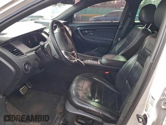 ✅ 2015 Ford Taurus SHO • VIN: 1FAHP2KT3FG114100 • Lot: 91615195. Listed on Copart with 153,007 mi. Free auction sales archive from the USA and detailed vehicle history report at DreamBid. Image 7.