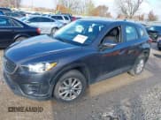 ✅ 2016 Mazda CX-5 Sport • VIN: JM3KE4BY9G0784667 • Lot: 43737851. Listed on IAAI with 151,569 mi. Free auction sales archive from the USA and detailed vehicle history report at DreamBid. Image 2.
