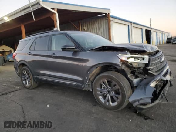 ✅ 2022 Ford Explorer XLT • VIN: 1FMSK8DHXNGC05952 • Lot: 89576575. Listed on Copart with 71,061 mi. Free auction sales archive from the USA and detailed vehicle history report at DreamBid. Image 4.