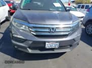 ✅ 2017 Honda Pilot EX-L • VIN: 5FNYF5H59HB030884 • Lot: 43118488. Listed on IAAI with 69,489 mi. Free auction sales archive from the USA and detailed vehicle history report at DreamBid. Image 12.