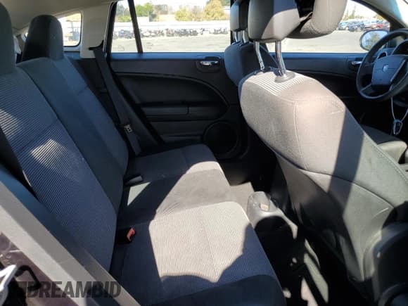 ✅ 2011 Dodge Caliber Heat • VIN: 1B3CB5HA7BD116584 • Лот: 82852494. Опубликован ранее на Copart с пробегом 194 300 миль. Бесплатный доступ к архиву аукционных продаж из США и подробный отчёт об истории автомобиля на DreamBid. Изображение 10.