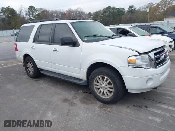 ✅ 2012 Ford Expedition XLT • VIN: 1FMJU1J56CEF06136 • Lot: 43875053. Listed on IAAI with 183,944 mi. Free auction sales archive from the USA and detailed vehicle history report at DreamBid. Image 1.