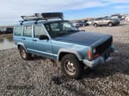 ✅ 1999 Jeep Cherokee SE • VIN: 1J4FF28S5XL646812 • Lot: 87951115. Listed on Copart with 230,161 mi. Free auction sales archive from the USA and detailed vehicle history report at DreamBid. Image 4.